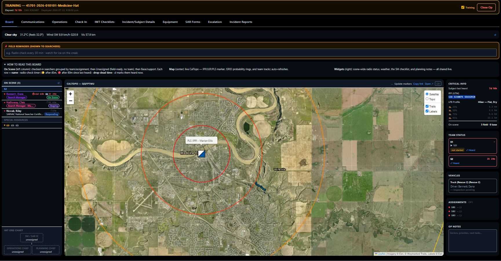 The SARManager Board during a training operation: on-scene searchers with radio-check and drop-dead timers, a field reminder banner, live weather, the IMT org chart, a CalTopo map with search probability rings, and side panels for critical info, team status, vehicles and assignments